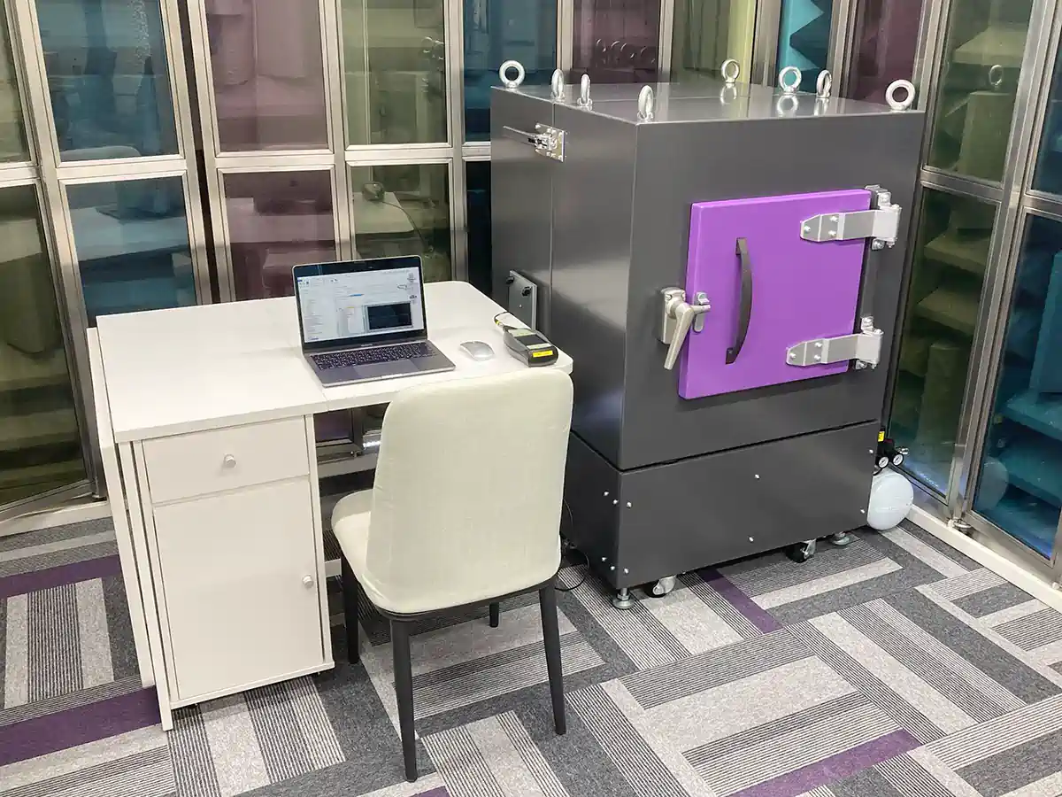 Whole setup showing Anechoic Test Box connected with handheld analyzer and laptop